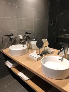 Kúpeľňa v ubytovaní Dahoam by Sarina - Village Appartements