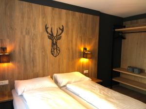 Posteľ alebo postele v izbe v ubytovaní Dahoam by Sarina - Village Appartements