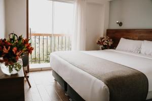 Katil atau katil-katil dalam bilik di Muru Homely Hotel Cusco
