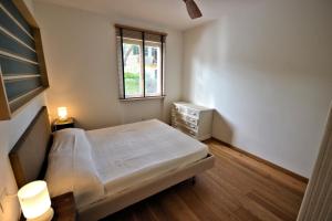 Cama ou camas em um quarto em Villa Montecristo
