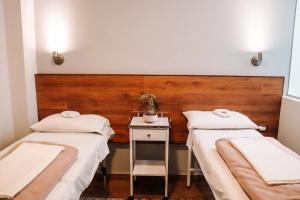 Katil atau katil-katil dalam bilik di Muru Homely Hotel Cusco
