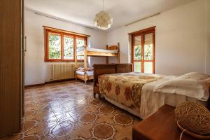 Hostel - Bormio - Livigno - Santa Caterina - Stelvio tesisinde bir ranza yatağı veya ranza yatakları