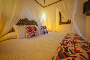 Tempat tidur dalam kamar di Espuma Hotel - Adults Only