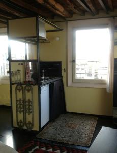 A kitchen or kitchenette at Torre Ducale Dimora Storica
