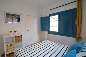Posteľ alebo postele v izbe v ubytovaní LOVELY FLAT FIRA MWC