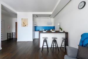 Køkken eller tekøkken på Centre Point Ilumino by LovŁódźApartments