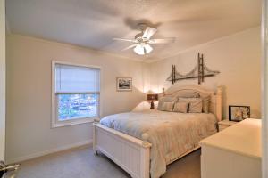 a bedroom with a bed and a ceiling fan at Bayfront Condo 3 Mi to Downtown St Petersburg in St Petersburg +22 photos
