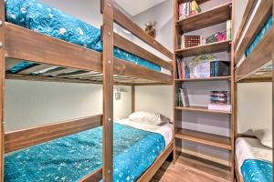a bunk bed room with two bunk beds at Solitude Mountain Slopeside Ski Condo with Hot Tub! in Brighton