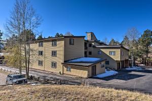 a large house with a car parked in front of it at Angel Fire Mtn Escape Walk to Chile Express Lift! in Angel Fire