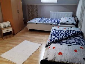 A bed or beds in a room at Micófogadó