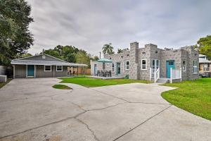 an old stone house with a driveway at Spacious Winter Garden Home with BBQ, Walk to Dwtn! in Orlando