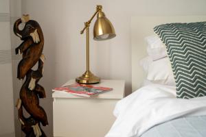 Posteľ alebo postele v izbe v ubytovaní Medicover Wilanow P&O Serviced Apartments
