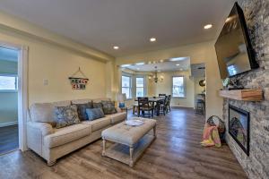 a living room with a couch and a table at Seaside Wildwood Haven Walk to BoardwalkandBeach! in Wildwood Crest