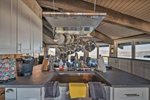 a kitchen with a sink and a counter top at Sierra Blanca Mountain Retreat 16 Miles to Ruidoso in Nogal