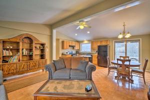 a living room with a couch and a table at Quiet Catskills Getaway w/ Deck & Mtn Views in New Kingston