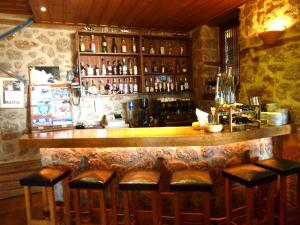 Lounge alebo bar v ubytovaní Pigi Tarlampa Hotel