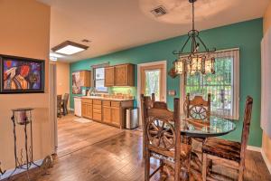a kitchen and dining room with a table and chairs at Shared Backyard and Hot Tub Restful Mesa Retreat! in Mesa +18 photos