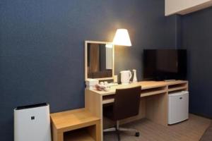 an office with a desk with a computer and a chair at Country Hotel Takayama - Vacation STAY 67708 in Takayama