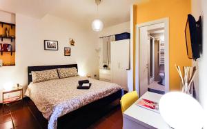 מיטה או מיטות בחדר ב-Casa Sofia - beauty apartment close Vatican Museum