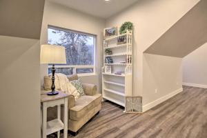 a living room with a couch and a window at Chic Farmhouse with Creek in Heart of Wine Country! in McMinnville