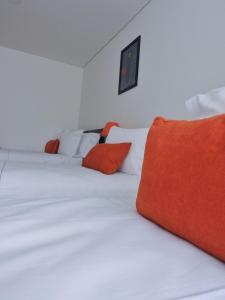 Postel nebo postele na pokoji v ubytování Hotel Portal de los Andes