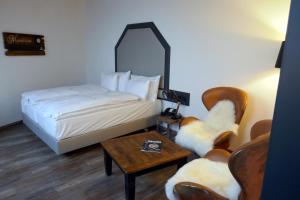 Voodi või voodid majutusasutuse Boutiquehotel Thessoni Classic & Self service Residence Home Zürich toas
