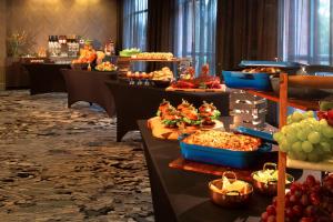 a buffet line with many different types of food at Silver Cloud Hotel - Seattle Broadway in Seattle