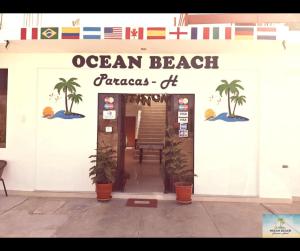 an entrance to an ocean beach fiscales office at Hotel Ocean Beach Paracas in Paracas