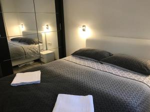 Posteľ alebo postele v izbe v ubytovaní Apartmani Jukic