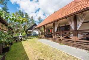 Vonkajšia záhrada v ubytovaní Dom Kaszubski nr 65