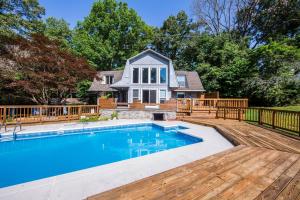 a house with a swimming pool and a wooden deck at Summer books up fast here!!! Taking 2020 bookings in Knoxville
