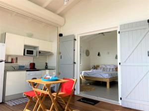 Cucina o angolo cottura di Bungalow Palbéa supérieur avec SPA et vue mer