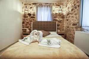 Postel nebo postele na pokoji v ubytování Olive Grove Deluxe apartment