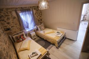 Postel nebo postele na pokoji v ubytování Olive Grove Deluxe apartment