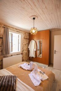 Postel nebo postele na pokoji v ubytování Olive Grove Deluxe apartment