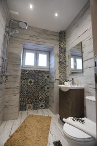 Koupelna v ubytování Olive Grove Deluxe apartment