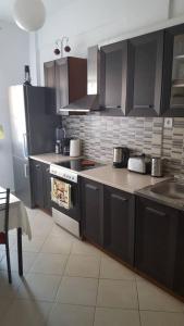 Kuchyňa alebo kuchynka v ubytovaní cELLATE cozy home