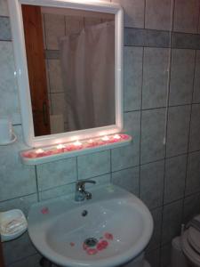 Koupelna v ubytování Guesthouse Rousis
