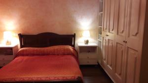 Ein Bett oder Betten in einem Zimmer der Unterkunft Appartamento Pescoluce