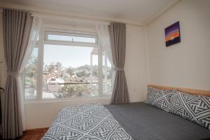 Postel nebo postele na pokoji v ubytování Homestay BỒ CÔNG ANH