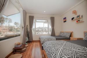 Postel nebo postele na pokoji v ubytování Homestay BỒ CÔNG ANH