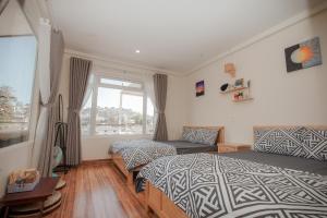 Postel nebo postele na pokoji v ubytování Homestay BỒ CÔNG ANH