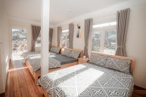 Postel nebo postele na pokoji v ubytování Homestay BỒ CÔNG ANH
