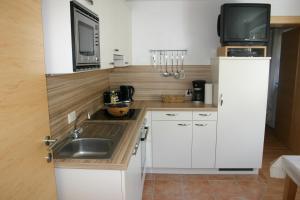 Kuchyňa alebo kuchynka v ubytovaní Ferienwohnung Prosch