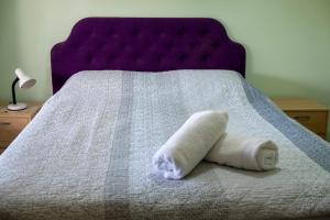 
A bed or beds in a room at Busselton Marina Bed and Breakfast
