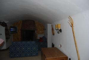 Posteľ alebo postele v izbe v ubytovaní Cueva El Haro