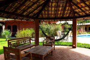 A piscina localizada em Pousada Tupinamba ou nos arredores
