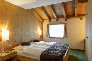 Postel nebo postele na pokoji v ubytování Hotel Saluver + 37 fotografií