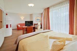 Posteľ alebo postele v izbe v ubytovaní Hotel Barbarahof 4 stars Superior - including Summer Card - Adults Only "soft" from 10 years