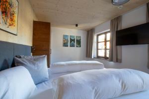 Letto o letti in una camera di Wally Berg-Appartements